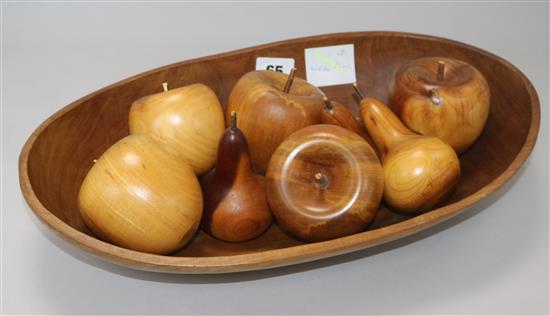 Eight New Zealand turned wood fruit and a bowl (9) length 39cm